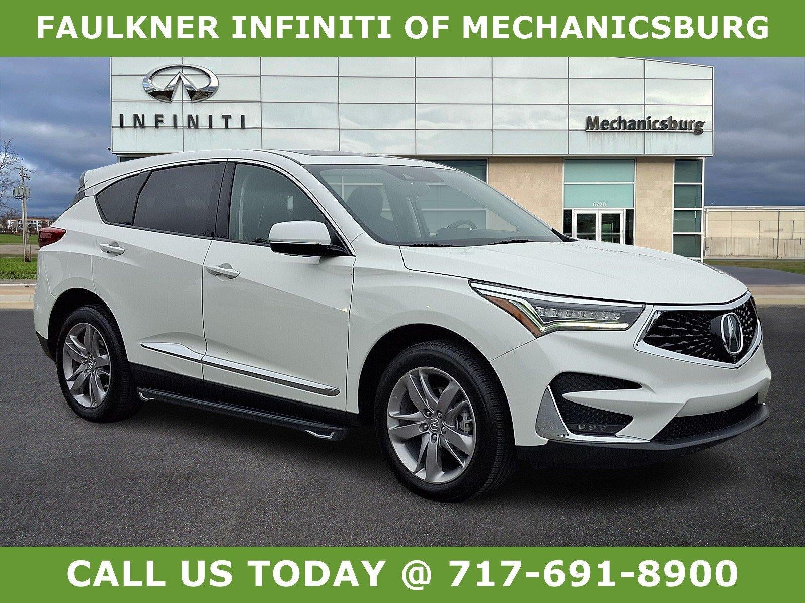 2020 Acura RDX SH-AWD w/Advance Pkg in Platinum White — front three-quarter view