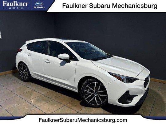 2024 Subaru Impreza Sport AWD in Crystal White Pearl — front three-quarter view