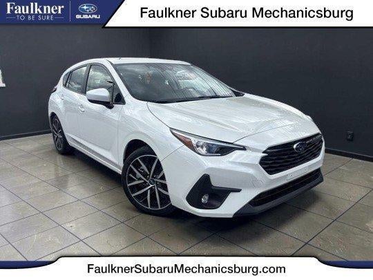 2024 Subaru Impreza Sport AWD in Crystal White Pearl — front three-quarter view