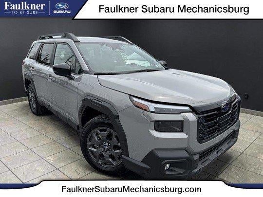 2026 Subaru Outback Premium AWD in River Rock Pearl — front three-quarter view