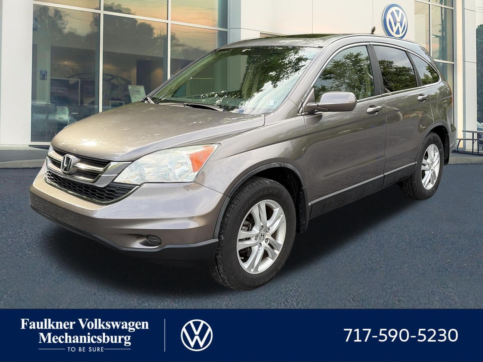 2010 Honda CR-V EX-L 4WD in Urban Titanium Metallic — front three-quarter view