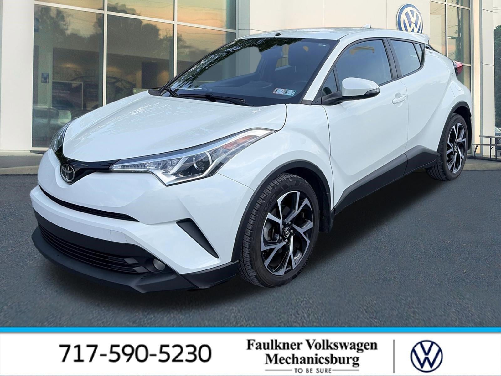 2018 Toyota C-HR XLE Premium FWD (Natl) in Blizzard Pearl — front three-quarter view