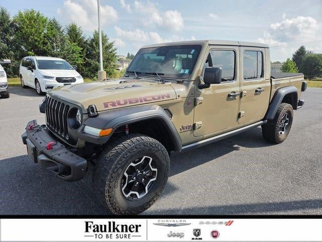 2020 Jeep Gladiator Rubicon 4x4 in Gator Clearcoat — front three-quarter view