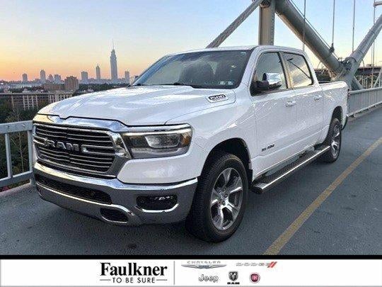 2023 RAM 1500 Laramie 4x4 Crew Cab 5'7" Box in Bright White Clearcoat — front three-quarter view