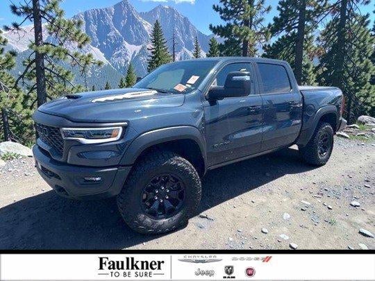 2025 RAM 1500 RHO 4x4 Crew Cab 5'7" Box in Forged Blue Metallic — front three-quarter view