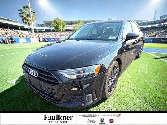 2021 Audi A8 L 55 TFSI quattro in Mythos Black Metallic — front three-quarter view