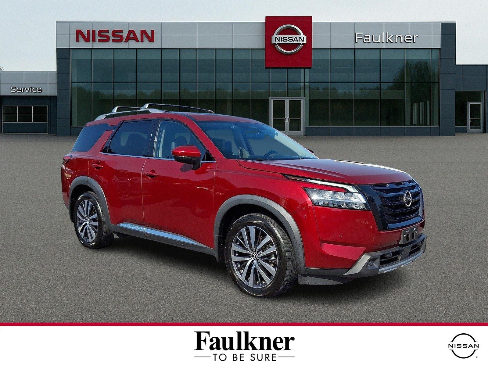 2022 Nissan Pathfinder Platinum in Scarlet Ember — front three-quarter view